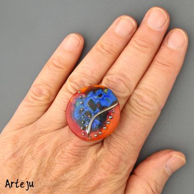 Glass Cabochon with shades of red, blue and orange