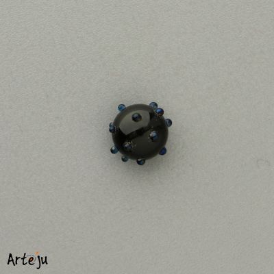 Minitop round in black with dots in black