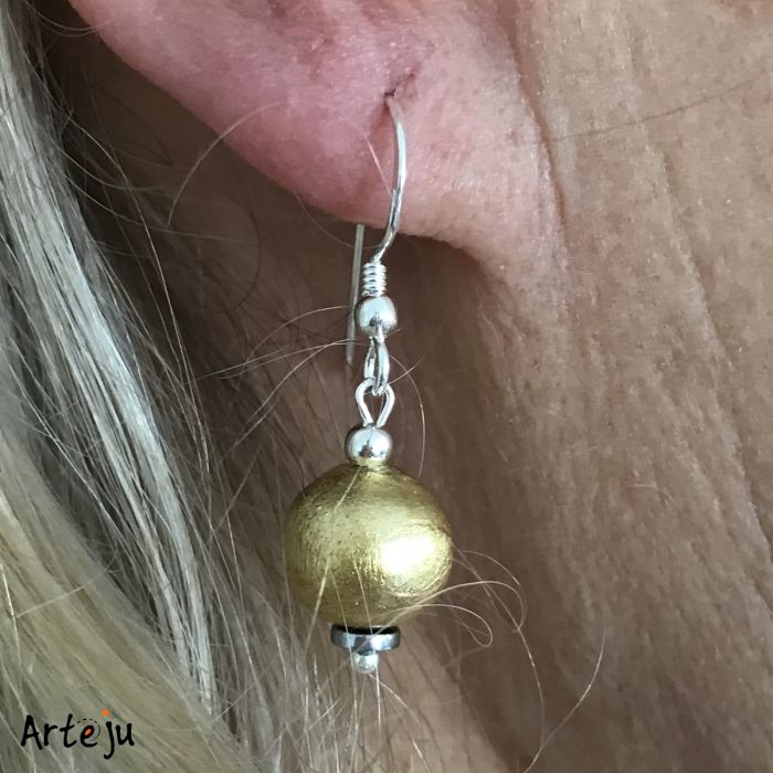 Earring with wooden ball covered with gold leaf, resin-coated 